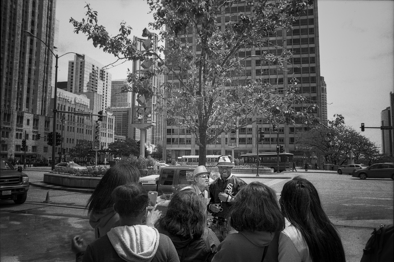 #17 street performing with a crowd.