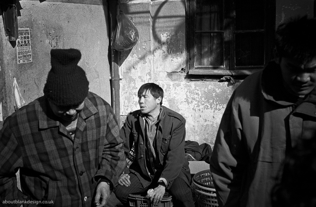 #6 Salesman at a still active street market.