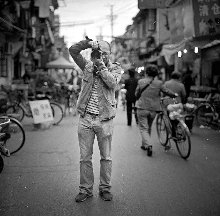 #1 Wei Min taking my photo.