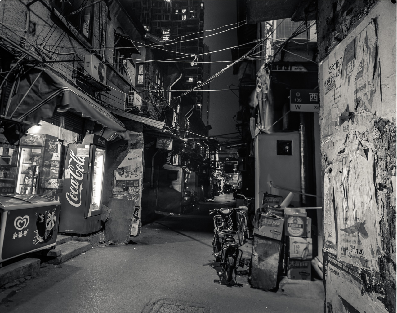 #49 Action shot of a back alley in Laoximen at night. Yes I got a coke after I took it. Yes it was delicious.