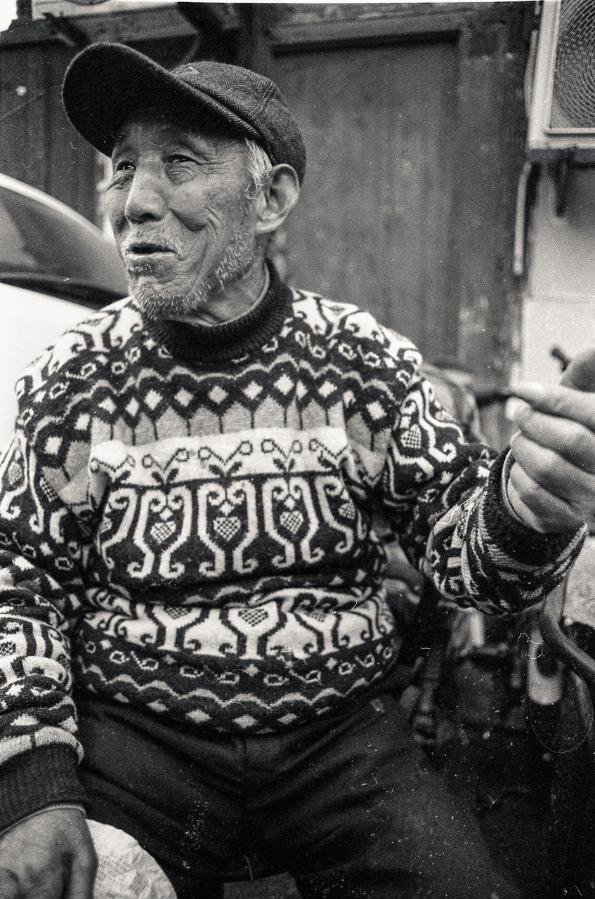 #7 We revisited Xiaonanmen and Laoximen and ran into this gentleman. He was adamant that all foreigners are spies because his grandma told him so. He also wanted me to take a picture of his dog.